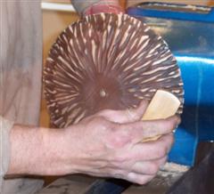 Brushing wax polish into bowl